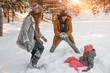 canvas print picture - funny wintertimes with parents and child