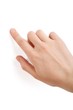 Pointing finger touching white background