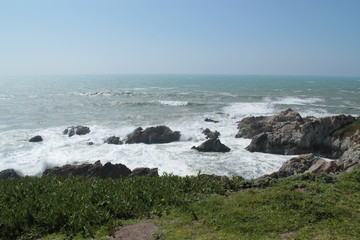 waves crashing over rocks in Bodega Bay