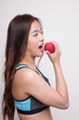 © halfbottle - Beautiful Asian healthy girl with apple.