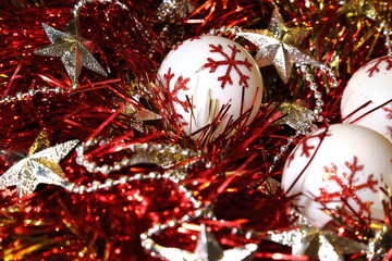 christmas and new year background with tinsel and christmas toys.