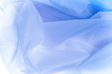 Texture, background,  The texture of the silk fabric is blue. Silk fabric is transparent. Fabric or liquid wave illustration wavy creases of silk satin texture or velvet material or blue luxurious