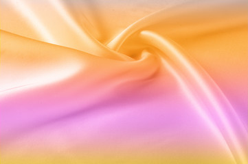 Texture, background, pattern. Silk fabric yellow, pink background. Abstract red pink orange silk background. Smooth elegant silk can be used as a background. Hot pink, yellow satin fabric close-up