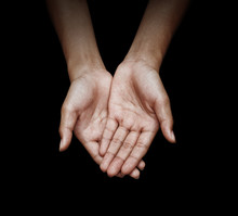Woman Cupped Hand In Black Background With Clipping Path