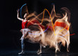 © zinkevych - Active sport. Beautiful nice young woman standing on stage and practicing dance movements while preparing a performance