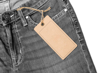 Label price tag mockup on blue jeans.