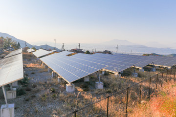 Solar power panels ,Photovoltaic modules for innovation green energy for life with blue sky background.