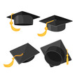 Set of mortarboard caps with golden tassels from different sides