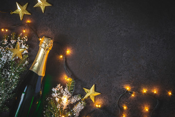 Wall Mural - Christmas background with champagne and luminous garland