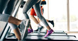 © NDABCREATIVITY - Picture of people running on treadmill in gym