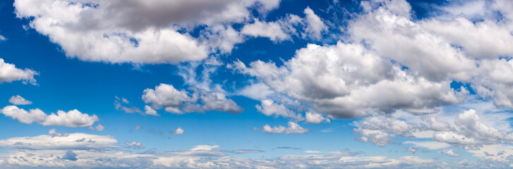 Wall Mural - Blue sky with white fluffy clouds panorama