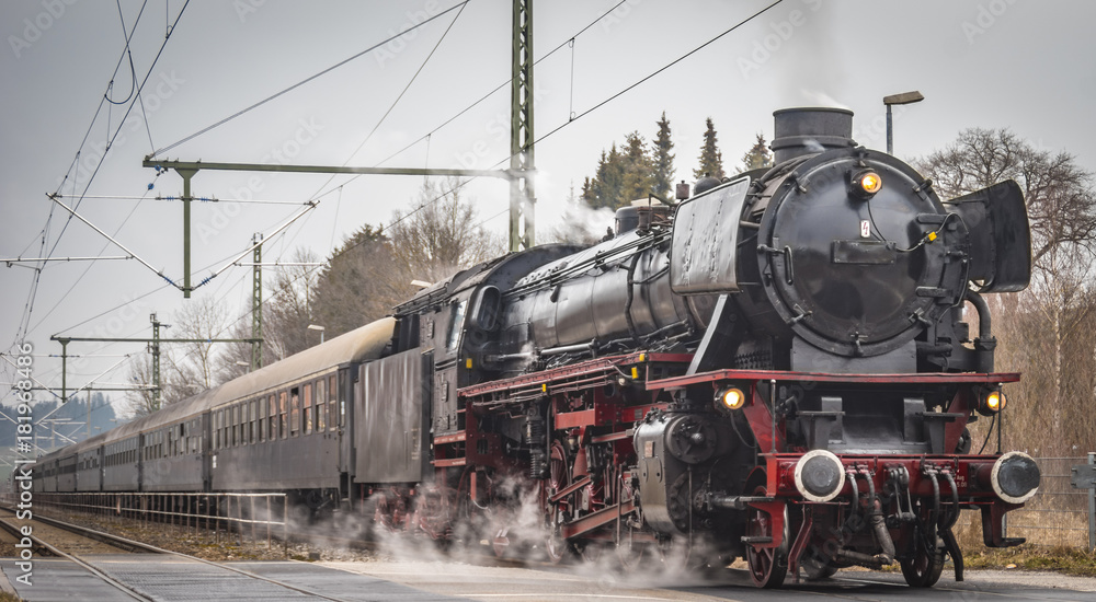 vintage black steam powered railway train - obrazy, fototapety, plakaty 