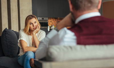 Upset woman during psychotherapy session