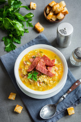 Wall Mural - Split pea soup with smoked ham and croutons