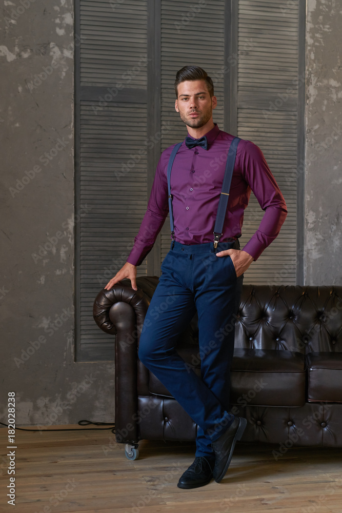Man model in purple shirt and blue trousers Stock Photo | Adobe Stock Man model in purple shirt and blue trousers Stock Photo | Adobe Stock