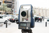 Fototapeta Mapy - total station with busy road in modern city