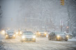 A winter snowstorm brings traffic to a slow crawl on Fifth Avenue. 