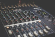 © DedMityay - Sound operator console or sound mixer control panel of DJ for music mixing and recording on studio or party