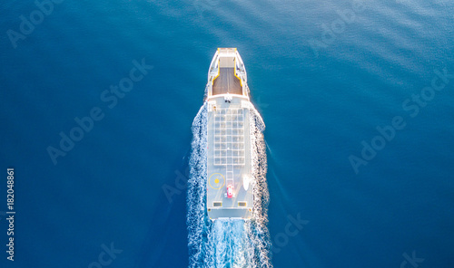 Fotomural CORFU, GREECE- NOVEMBER 24, 2017: A ferry of the Lefkimmi Lines in Corfu Greece crossing opposite Corfu island towards Greece mainland
