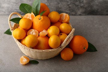 Wall Mural - Basket with ripe citrus oranges