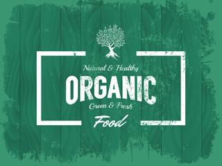 Sticker - Vintage organic, natural and healthy food vector logo isolated on wood board background.
Premium quality green and fresh products grunge logotype emblem illustration. Superior signboard retro design.