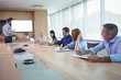 © WavebreakMediaMicro - Business people at conference table in board room