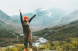 Traveling Woman happy enjoying foggy mountains landscape outdoor emotions Lifestyle success concept adventure active vacations in Norway Jotunheimen park