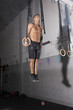 © davidaguerophoto - Strong gymnast guy on the rings