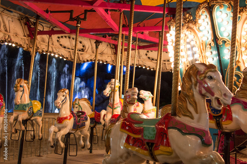 Fotografie, Obraz Park horse carousel ride, ferris wheel kids old attraction