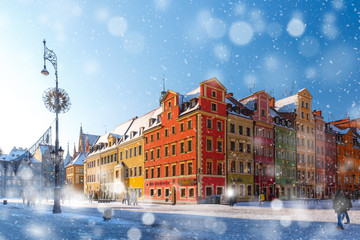 Fototapete - Multicolored traditional historical houses on Market square in the winter snowy morning, Old Town of Wroclaw, Poland