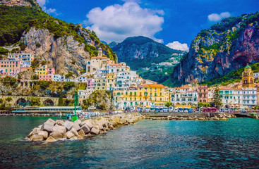 wonderful italy. the small haven of amalfi village with a turquoise sea and colorful houses on the s