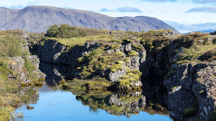 Wall Mural - view of Silfra fault in valley of Thingvellir