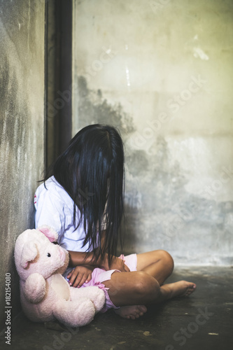 sad teddy bear with girl