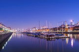 Fototapeta Miasto - boats and buildings in city at night