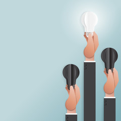 Aufkleber - Business creative idea concept.Hand of businessman holding origami light bulb paper art style.Vector illustration.