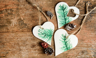 Christmas ornaments on rustic wooden background