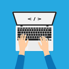 Developer, programmer working with laptop and typing code. Programming and coding background concept. Hands on laptop in top view