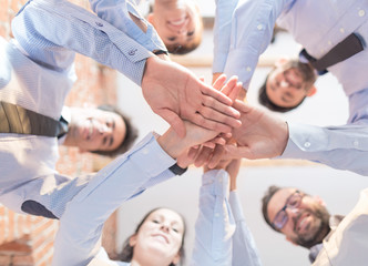 Wall Mural - stack of hands. unity and teamwork concept.