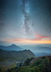 Wall Mural - Mountain valley during sunrise. Natural landscape in the summer time