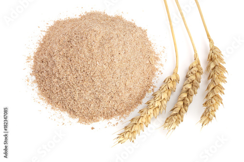 Fotografia, Obraz Pile of wheat bran with ears isolated on white background