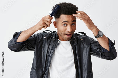 Close Up Of Attractive Young Dark Skinned Man With Afro Hairstyle