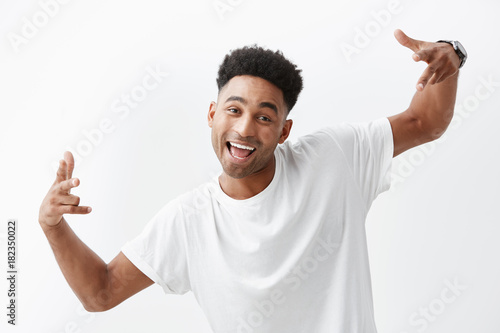 Close Up Of Young Cheerful Dark Skinned Beautiful African Man With