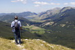 © ciroorabona - hiker in mountain landscape valley and lake