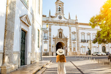 Young Woman In Hat In Front Of Church, Faro, Portugal
