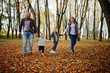 © AS Photo Family - Happy caucasian family of mom dad and little girl with boy at majestic autumn fall forest.