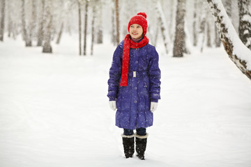 Wall Mural - portrait of a cute girl in the winter