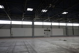 Fototapeta Pomosty - empty industrial shed