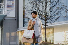 Woman Walking With Shopping Bags