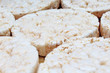 Stack of puffed whole grain crispbread. Rice cake puffed rice texture.Round rice cakes background. Corn crackers. Rice galettes Studio photo texture photography.