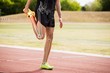© WavebreakMediaMicro - Highlighted bones of athlete man stretching on race track